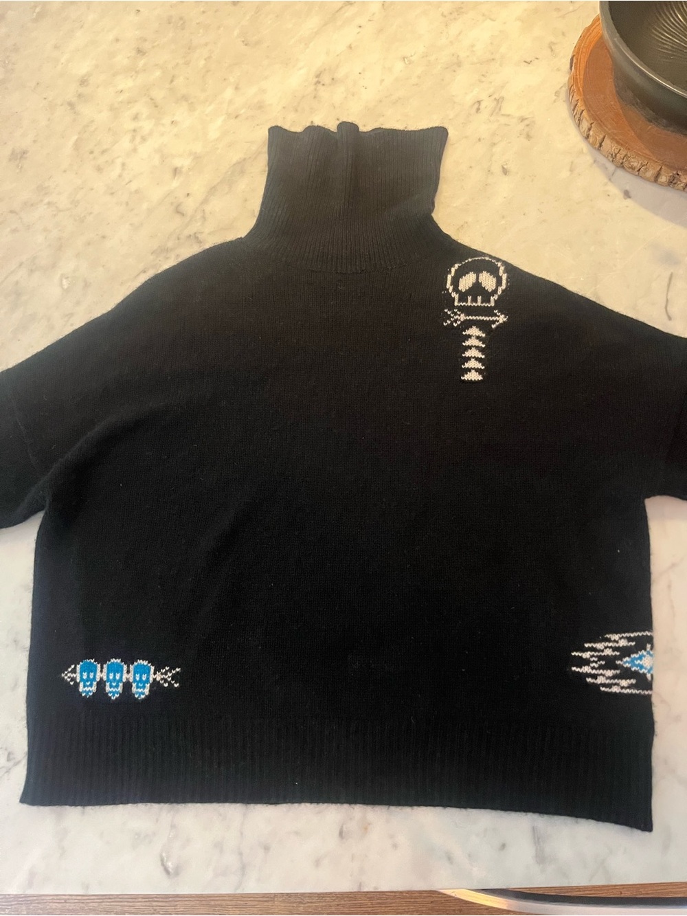 360 Cashmere women’s Black Turtleneck Sweater with Blue Skull Detail